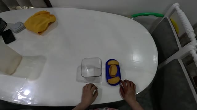 Moving food toward a container