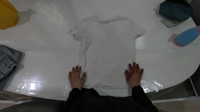 Starting a shirt fold